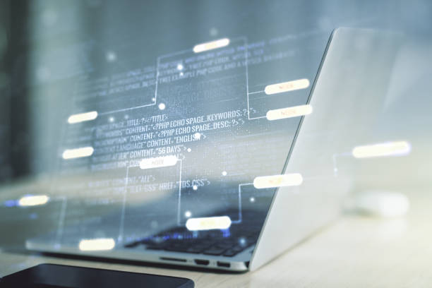 istock Double exposure of abstract programming language on laptop background, research and development concept 1493910100