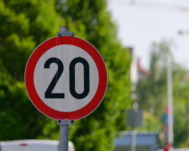 istock Selective focus shot of a Maximum Speed Limit 20 Street Sign 1493914582