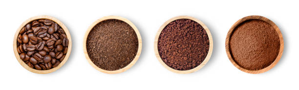 Coffee bean and  ground coffee Roasted coffee beans and coffee powder (ground coffe) in wooden bowl isolated on white background. Top view. Flat lay instant coffee stock pictures, royalty-free photos & images