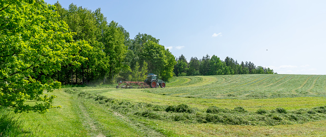 farmer with tractor in field