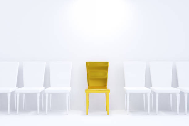 istock One gold chair between white chairs. A row of chairs on a white background. 1493920861