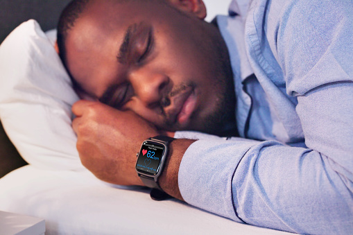 Man Sleeping With Smart Watch