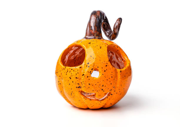 istock Pumpkin candlestick for candles on a white background. 1493929560