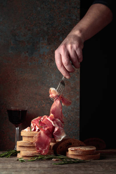 istock The hand of a prosciutto thief. 1493933384