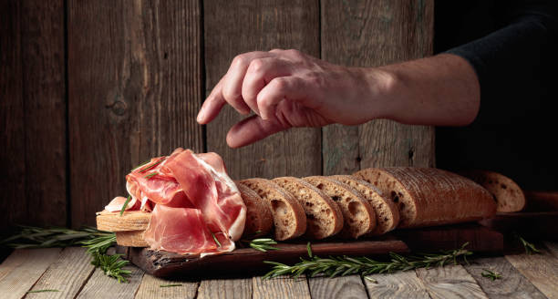 istock The hand of a prosciutto thief. 1493933466