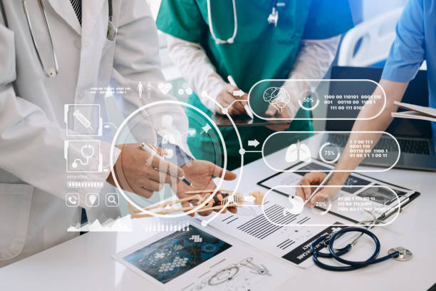 istock Medical technology network team meeting concept. Doctor hand working with smart phone modern digital tablet and laptop computer with graphics chart interface, with virtual icon 1493936655