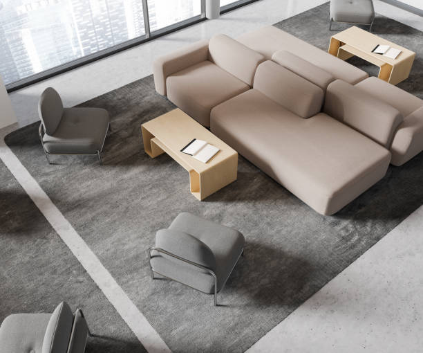istock Top view of office interior lounge zone with couch, panoramic window 1493936668