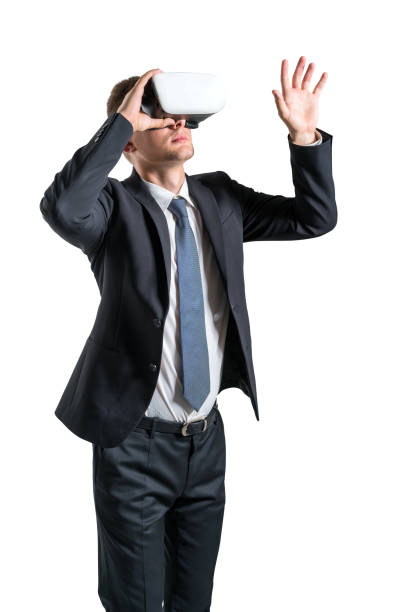 istock Businessman working in vr headset isolated over white background 1493936969