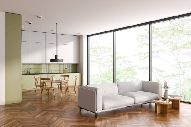 istock Green and white kitchen and living room 1493937005