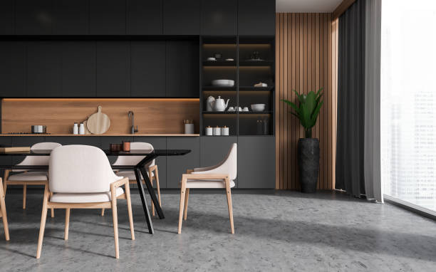 istock Gray and wooden kitchen with cupboard and table 1493937329