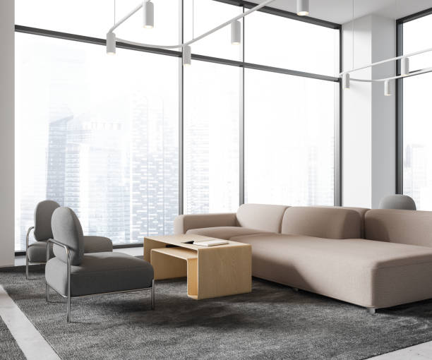 istock Armchair and couch in white office waiting room 1493937374