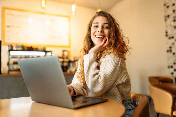 istock Young woman with laptop at home. 1493938512