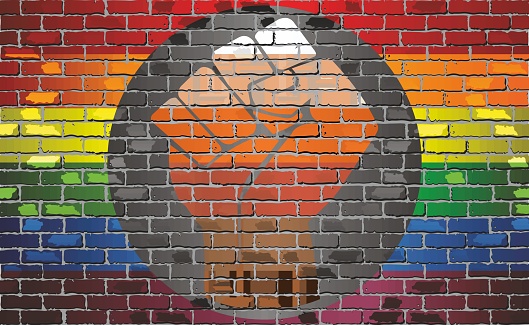 Queer People of Color Flag on brick wall - illustration, 
QPOC Pride Flag