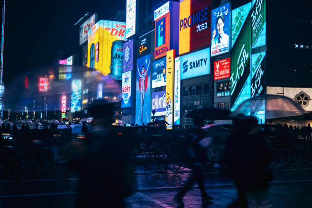 Located in Osaka, Japan, Dotonbori dazzles with its vibrant and colorful signs that come to life at night, creating an enchanting atmosphere. After the impact of the COVID-19 pandemic, tourists have begun to flock back, bringing a renewed energy to the area. This captivating photo was taken on April 15, 2023, perfectly capturing the mesmerizing beauty of Osaka's bustling nightlife.