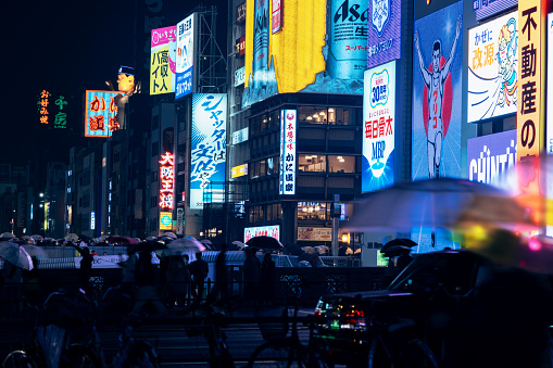 Located in Osaka, Japan, Dotonbori dazzles with its vibrant and colorful signs that come to life at night, creating an enchanting atmosphere. After the impact of the COVID-19 pandemic, tourists have begun to flock back, bringing a renewed energy to the area. This captivating photo was taken on April 15, 2023, perfectly capturing the mesmerizing beauty of Osaka's bustling nightlife.