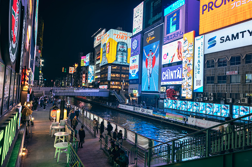 Located in Osaka, Japan, Dotonbori dazzles with its vibrant and colorful signs that come to life at night, creating an enchanting atmosphere. After the impact of the COVID-19 pandemic, tourists have begun to flock back, bringing a renewed energy to the area. This captivating photo was taken on April 15, 2023, perfectly capturing the mesmerizing beauty of Osaka's bustling nightlife.