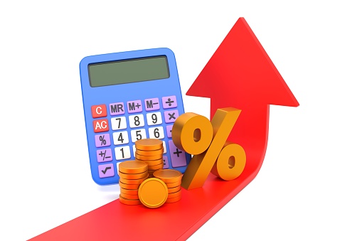 A purple calculator behind a stack of gold coins and percentage sign sitting on a large red arrow pointing up - plain white background 3D render