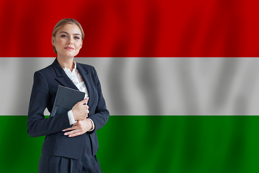 Hungarian businesswoman on the flag of Hungary digital  nomad, business, startup concept