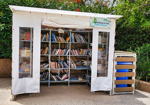 Raanana, Israel. May 18, 2023. Small public free library in Lev Hapark, Raanana.