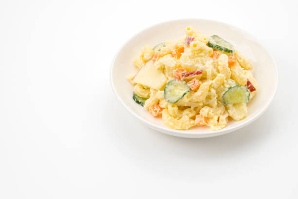 istock macaroni and potato salad on white background 1493951488