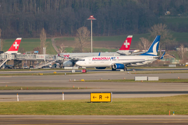 Zurich, Switzerland, January 20,2023 Anadolu Boeing 737-8F2 aircraft is taking off from runway 28