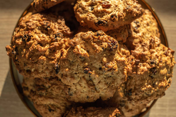 istock Oatmeal Cookies with raisins on a platter close-up. 1493955747
