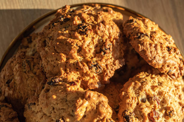 istock Oatmeal Cookies with raisins on a platter close-up. 1493955865