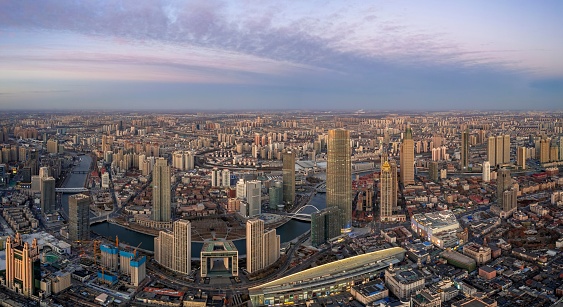 A cityspace of Tianjin with its beautiful skyscrapers during the sunset in China
