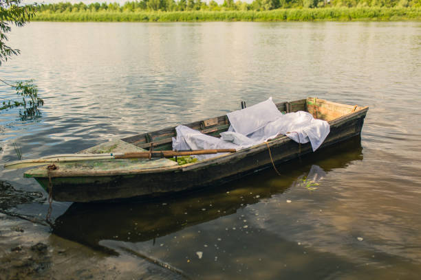 Hampi, coracle boat at Tungabhadra River, India, traditional round fishing basket boat made from cane, leather and bitumen