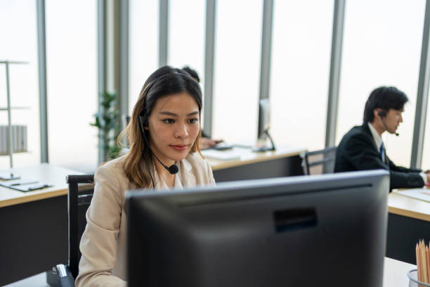 istock Young woman working in call centre 1493960242