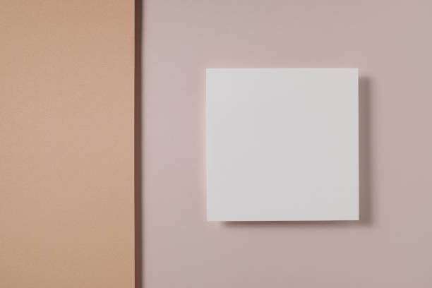 istock White blank greeting or invitation card mockup on beige paper background. Mock up presentation. 1493961040