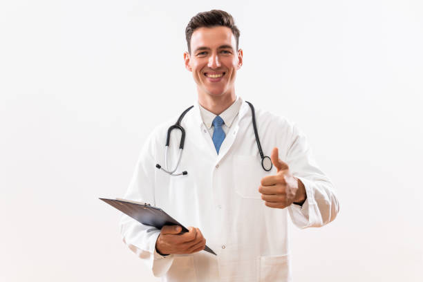 istock Doctor showing thumb up and holding documents 1493969741