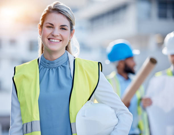 Construction worker, happy woman portrait or engineering contractor for career mindset, industry and building development. Young face of industrial person, builder or project manager in architecture