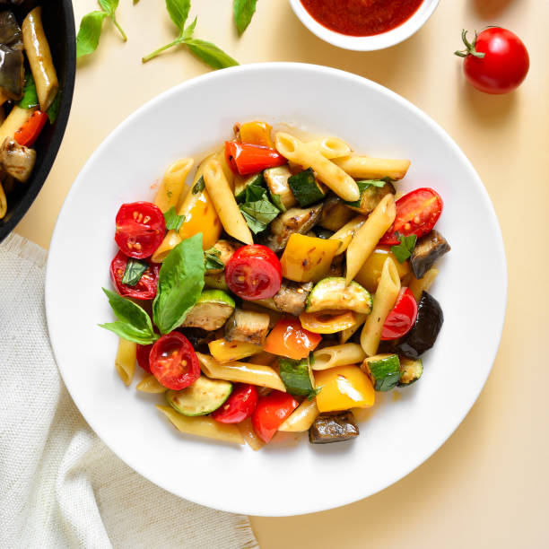 istock Penne pasta salad with roasted vegetables 1493971257