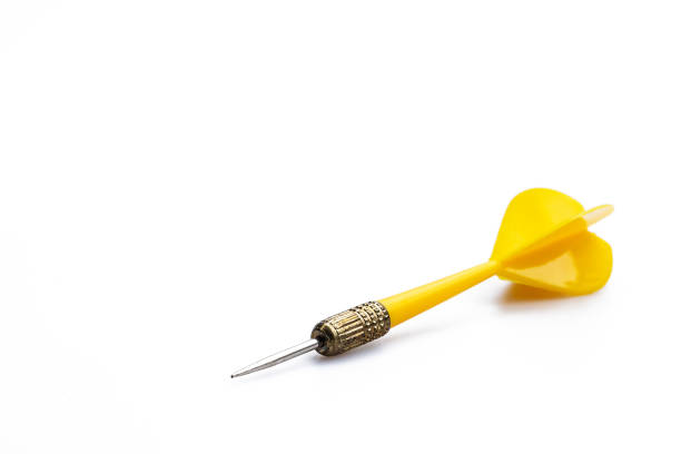 istock Yellow darts Isolated on white background, goal setting concept for success. 1493974049