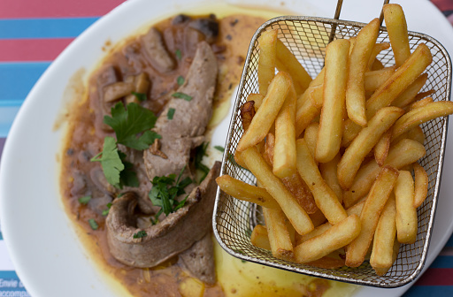 France: Traditional Lunch of Duck and Fries (in a Basket)