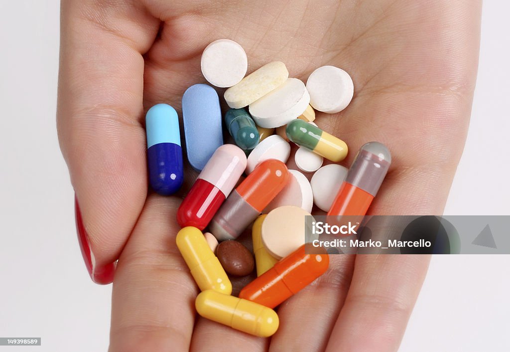 Tabletten in hand - Lizenzfrei Antibabypille Stock-Foto