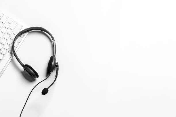 istock Headset and customer support equipment at call center ready for actively service , Communication support, call center and customer service help desk.for (call center) concept . 1493986693