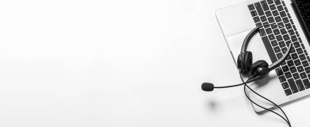 istock Headset and customer support equipment at call center ready for actively service , Communication support, call center and customer service help desk.for (call center) concept . 1493986703