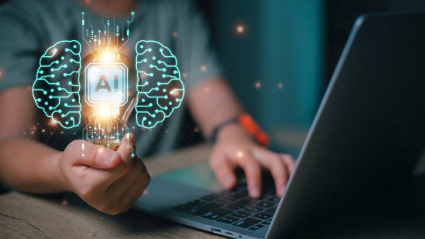 istock Artificial intelligence AI concept. Hand holds brain with shining wireframe, Neural networks in the light bulb of business networking technology innovation. 1493987872