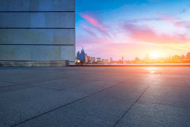 istock Empty floor and city skyline at sunset 1493988374