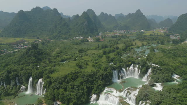 Aerial top view of Ban Gioc water Falls in Cao Bang, Vietnam and China border. Nature landscape background. Tourist attraction landmark.