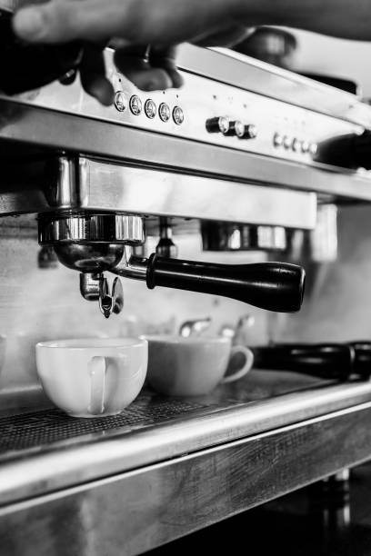 istock professional espresso coffee making machine close up in black and white 1493997664