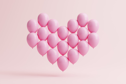 A group of pink balloons in the shape of heart on a pink background. Valentine's day concept. 3d render illustration