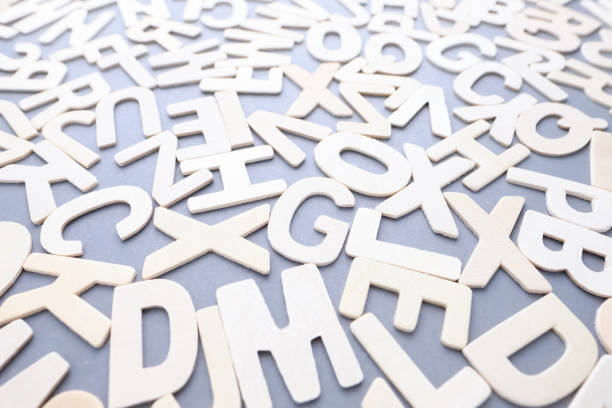 istock Scattered Wooden English Alphabets 1494003113