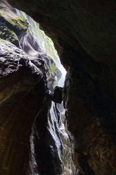 istock Scenic view of cliffs in the cave illuminated bysunlight. Partnach Gorge, Germany. 1494014849