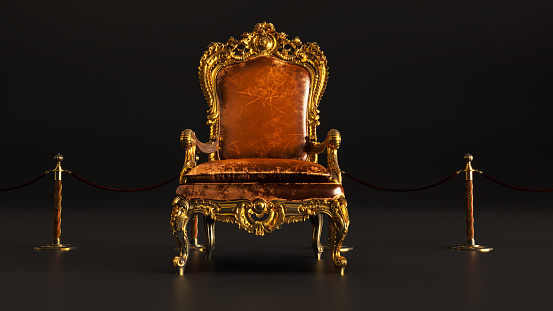 3D render of old king armchair with golden barrieres on black background, king throne