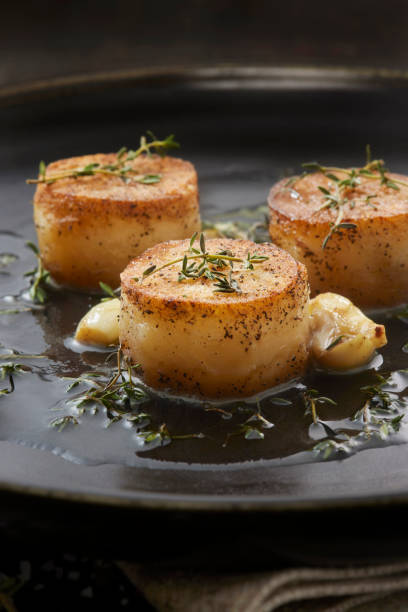 istock Fondant AKA Melting Potatoes in a Garlic and Thyme Butter 1494019398