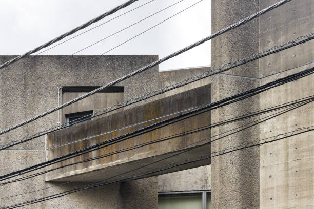 istock concrete building with overhead powerlines in front 1494023221