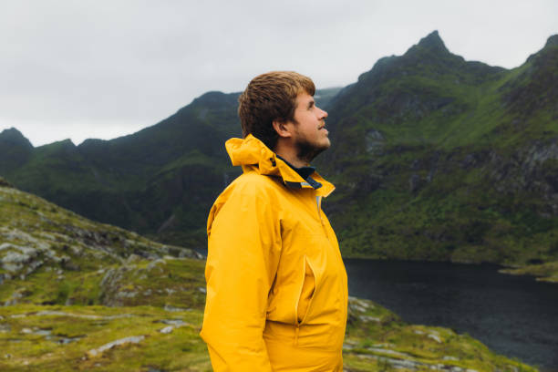 istock Happy man contemplating summer outdoors on Lofoten Islands 1494025442